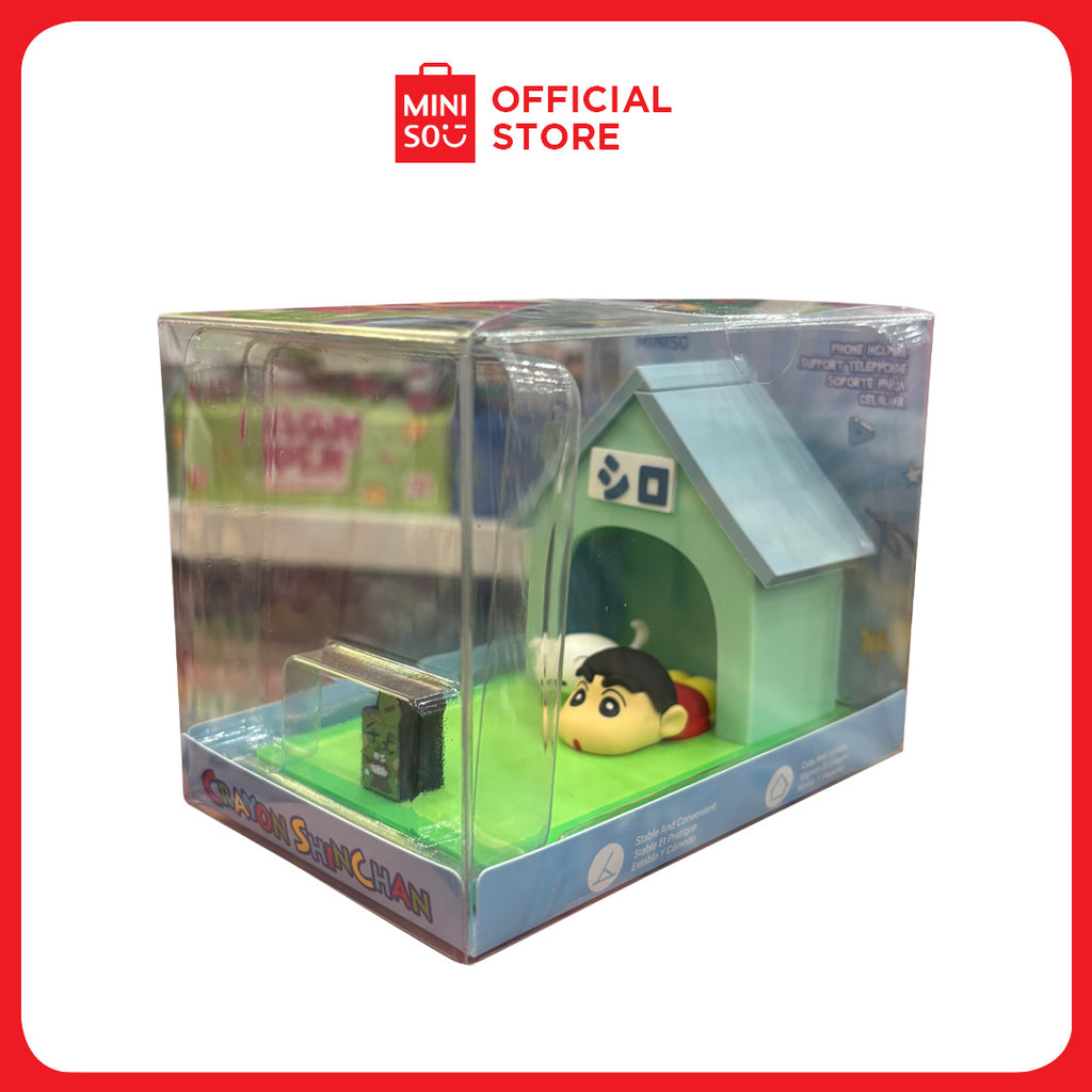 MINISO Crayon Shinchan Collection Desktop Phone Holder with Shinnosuke Nohara design for mobile phones on desk.